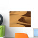 Berber 'blue man' walking through sand dunes in Erg Chebbi area Wall Mural