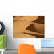 Berber 'blue man' walking through sand dunes in Erg Chebbi area Wall Mural