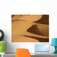Berber 'blue man' walking through sand dunes in Erg Chebbi area Wall Mural