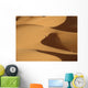 Berber 'blue man' walking through sand dunes in Erg Chebbi area Wall Mural
