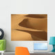 Berber 'blue man' walking through sand dunes in Erg Chebbi area Wall Mural