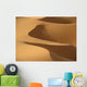 Berber 'blue man' walking through sand dunes in Erg Chebbi area Wall Mural