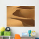 Berber 'blue man' walking through sand dunes in Erg Chebbi area Wall Mural