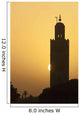 Morocco, Sun setting behind minaret of Koutoubia mosque Wall Mural