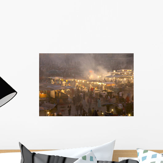 Morocco, People and food stalls in Place Djemaa el Fna at dusk Wall Mural