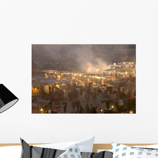 Morocco, People and food stalls in Place Djemaa el Fna at dusk Wall Mural