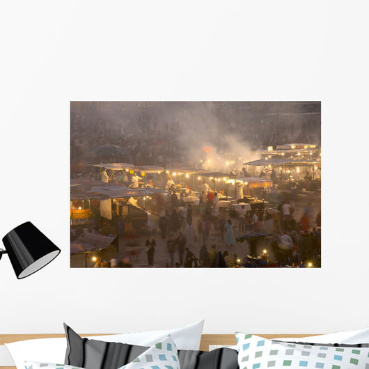 Morocco, People and food stalls in Place Djemaa el Fna at dusk Wall Mural