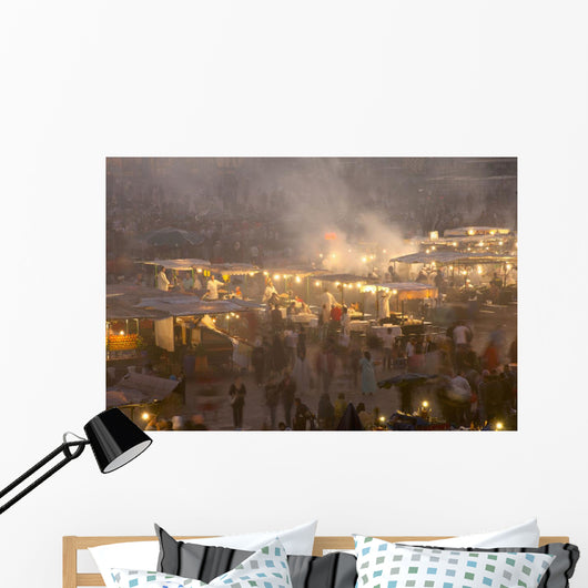 Morocco, People and food stalls in Place Djemaa el Fna at dusk Wall Mural