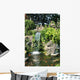 Waterfall and Koi pond in an Asian garden Wall Mural