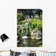 Waterfall and Koi pond in an Asian garden Wall Mural