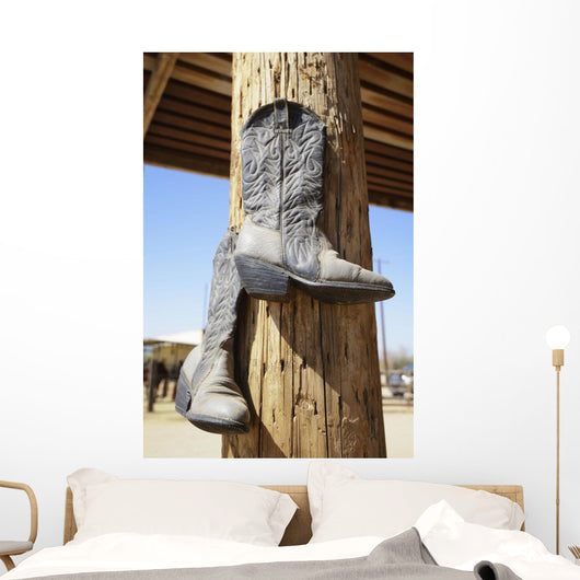 Cowboy Boots Hanging From A Post At A Riding Ranch;Arizona Usa Wall Mural