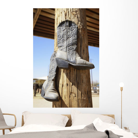 Cowboy Boots Hanging From A Post At A Riding Ranch;Arizona Usa Wall Mural