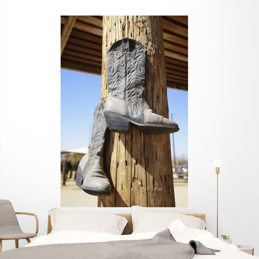 Cowboy Boots Hanging From A Post At A Riding Ranch;Arizona Usa Wall Mural