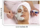 spa esthetician applying organic facial masque Wall Mural