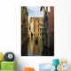 Italy, Venice, Rowing gondola through canal Wall Mural
