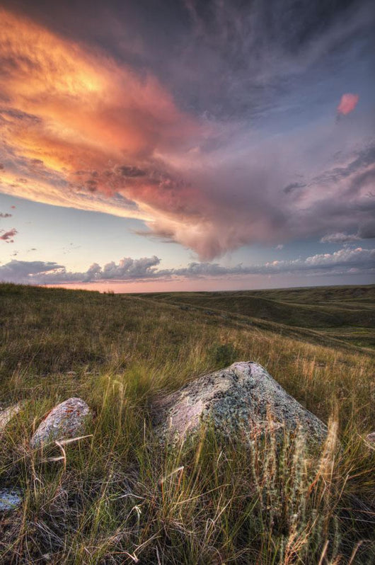 Clouds Lit At Sunset With Some Glacial Erratics Lying Wall Mural