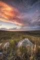 Clouds Lit At Sunset With Some Glacial Erratics Lying Wall Mural