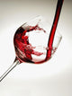 Red wine pouring into a glass Wall Mural
