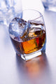 Glass of whiskey Wall Mural