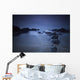 Long exposure of rocks on the beach at night;Newquay cornwall england Wall Mural