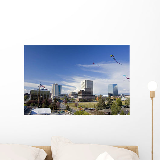 Kites Flying In Park Strip With Downtown Anchorage In Background Wall Mural