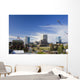 Kites Flying In Park Strip With Downtown Anchorage In Background Wall Mural