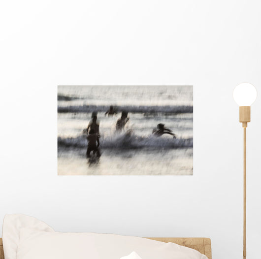 India, Karnataka, Blurry Figures In Crashing Waves At Gokarna Beach Wall Mural