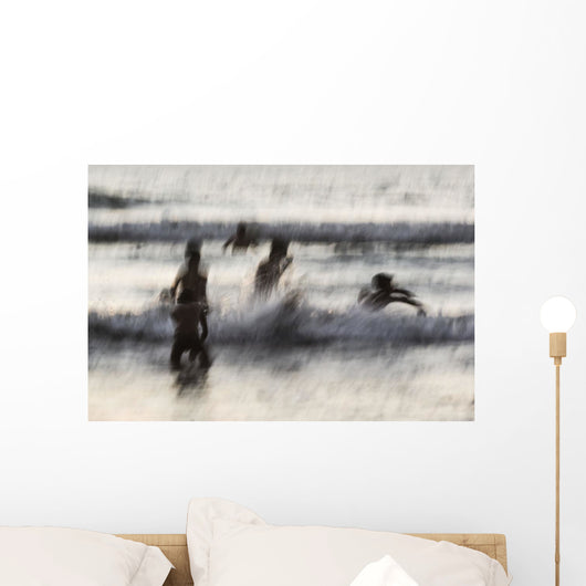 India, Karnataka, Blurry Figures In Crashing Waves At Gokarna Beach Wall Mural