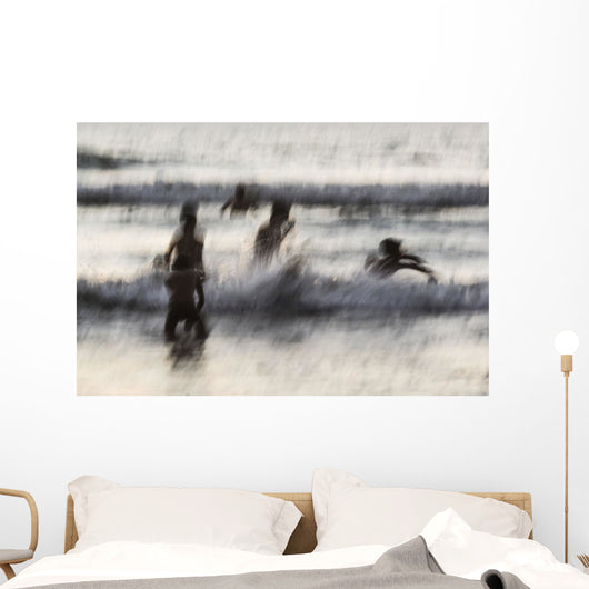 India, Karnataka, Blurry Figures In Crashing Waves At Gokarna Beach Wall Mural
