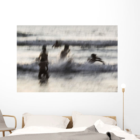 India, Karnataka, Blurry Figures In Crashing Waves At Gokarna Beach Wall Mural