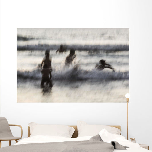 India, Karnataka, Blurry Figures In Crashing Waves At Gokarna Beach Wall Mural