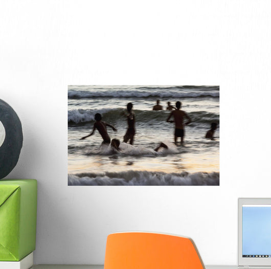 India, Karnataka, Blurry Figures In Crashing Waves At Gokarna Beach Wall Mural
