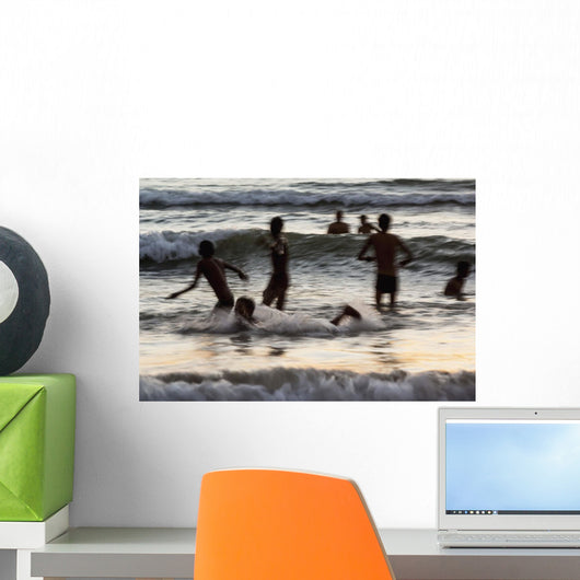 India, Karnataka, Blurry Figures In Crashing Waves At Gokarna Beach Wall Mural