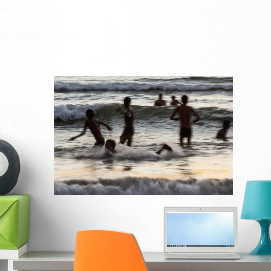 India, Karnataka, Blurry Figures In Crashing Waves At Gokarna Beach Wall Mural