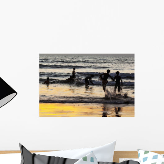 India, Karnataka, Blurry Figures In Crashing Waves At Gokarna Beach Wall Mural