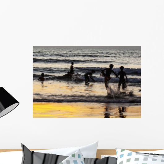 India, Karnataka, Blurry Figures In Crashing Waves At Gokarna Beach Wall Mural