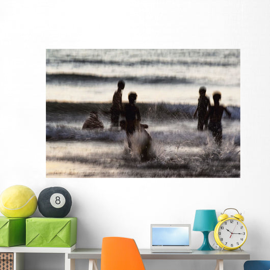 India, Karnataka, Blurry Figures In Crashing Waves At Gokarna Beach Wall Mural