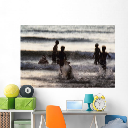 India, Karnataka, Blurry Figures In Crashing Waves At Gokarna Beach Wall Mural