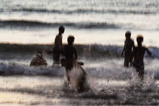 India, Karnataka, Blurry Figures In Crashing Waves At Gokarna Beach Wall Mural