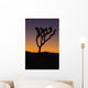 Silhouette of a joshua tree at sunset Wall Mural