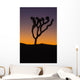 Silhouette of a joshua tree at sunset Wall Mural