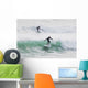 Surfers riding waves Wall Mural