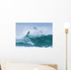 Surfer diving into water off his surfboard Wall Mural