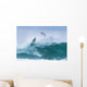 Surfer diving into water off his surfboard Wall Mural