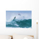 Surfer diving into water off his surfboard Wall Mural