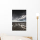 Rippled sand under a dark cloud Wall Mural