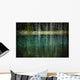 Trees reflected in the blue-green water of a small spring fed pond Wall Mural