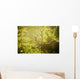 An elk with large antlers grazing in warm evening light Wall Mural