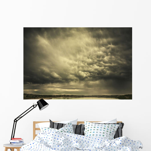 Mammatus storm clouds above a lake Wall Mural
