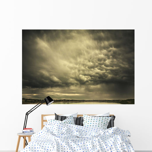 Mammatus storm clouds above a lake Wall Mural